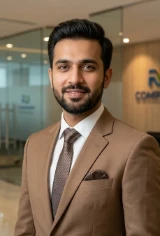 Portrait of a smiling businessman in a brown suit
