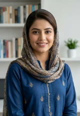 Portrait of a smiling businesswoman in a blue top